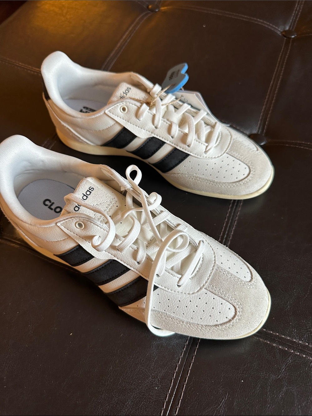 Adidas White Sneakers with Black Stripes